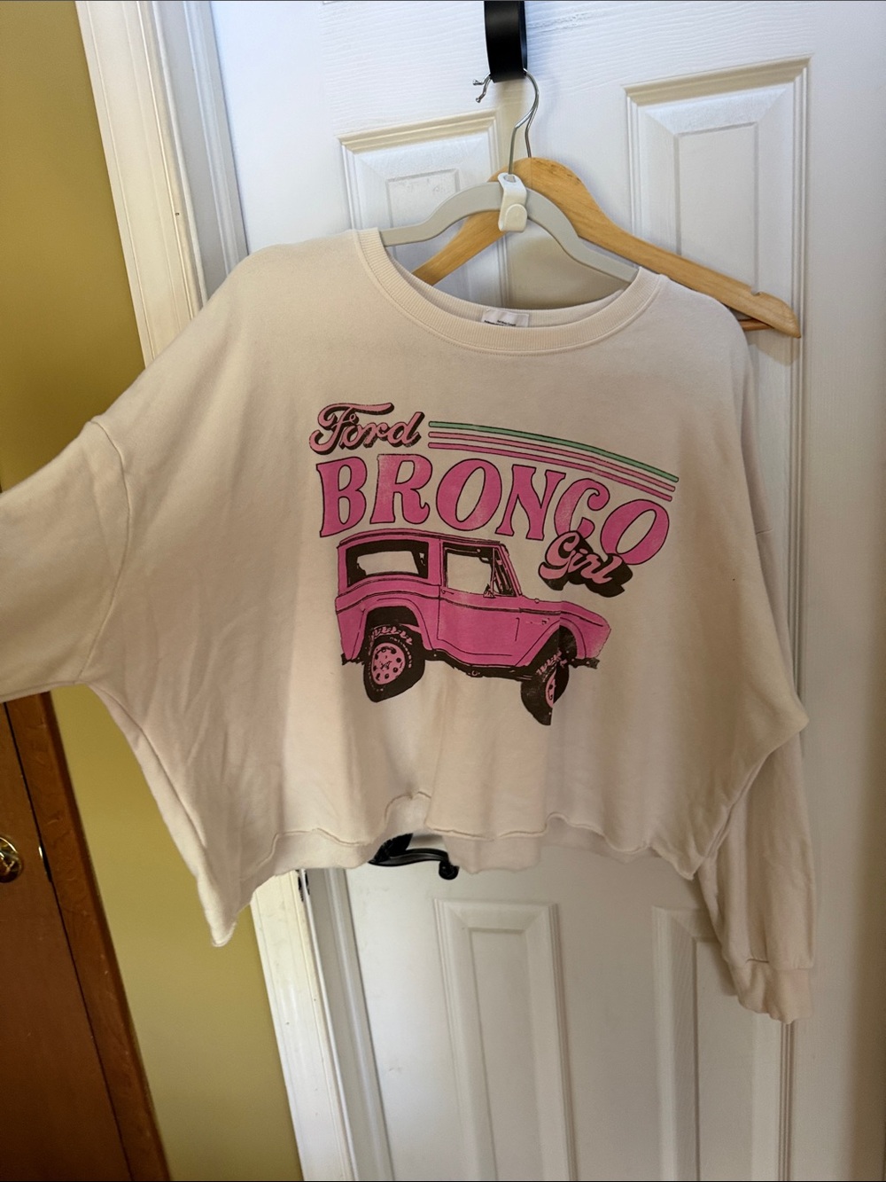 Ford Cream Sweatshirt with Pink Bronco Graphic and Green Accents
